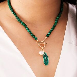 Green feather necklace